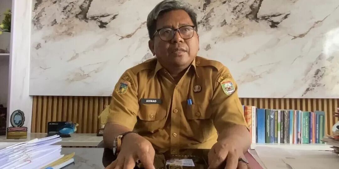 莫罗瓦利县人力资源和移民服务局局长艾哈迈德·ST（Marhum/SANGALU）