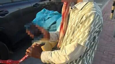 警方称，这名嫌疑人被捕时身上携带2万迪拉姆现金，他骑着自行车在城里四处乞讨。照片：迪拜警方