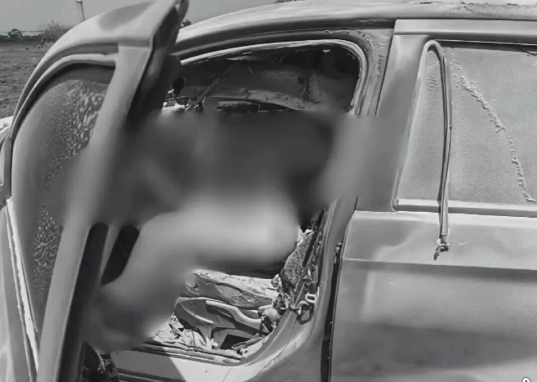 TWO charred bodies were discovered in a burning car in Nueva Ecija on Monday. (Photo via Liezle Inigo)