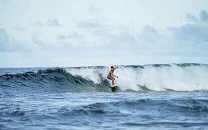 <p><strong>TOURIST</strong>. A surfer rides the wave off the coast of Siargao, one of the country's top surfing destinations, in this undated photo. On Thursday (May 14, 2026), the Department of Tourism reminded tourists to respect locals and heed domestic laws. <em>(Photo courtesy of DOT)</em></p>
