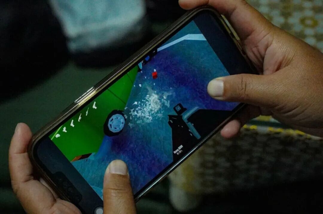 A mobile device displays the interface of the video game GoreBox on June 25, 2026. The Cybercrime Investigation and Coordinating Center (CICC) imposed a temporary ban on the physics-driven sandbox game after police investigators found that a 14-year-old Grade 9 student involved in a fatal school shooting in Tacloban City was a frequent player prior to the incident. (John Louie Abrina)