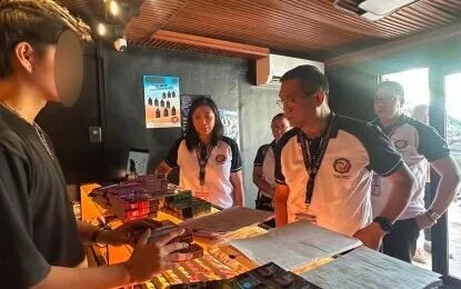 <p><strong>NATIONWIDE CRACKDOWN</strong>. Bureau of Internal Revenue (BIR) officials inspect a store as part of the agency's simultaneous nationwide Tax Compliance Verification Drive on July 20, 2026. BIR personnel inspected around 3,590 establishments engaged in the sale and distribution of cigarettes, vapor products, and heated tobacco products as part of its intensified campaign against illicit trade and excise tax violations.<em> (Photo courtesy of the BIR)</em></p>