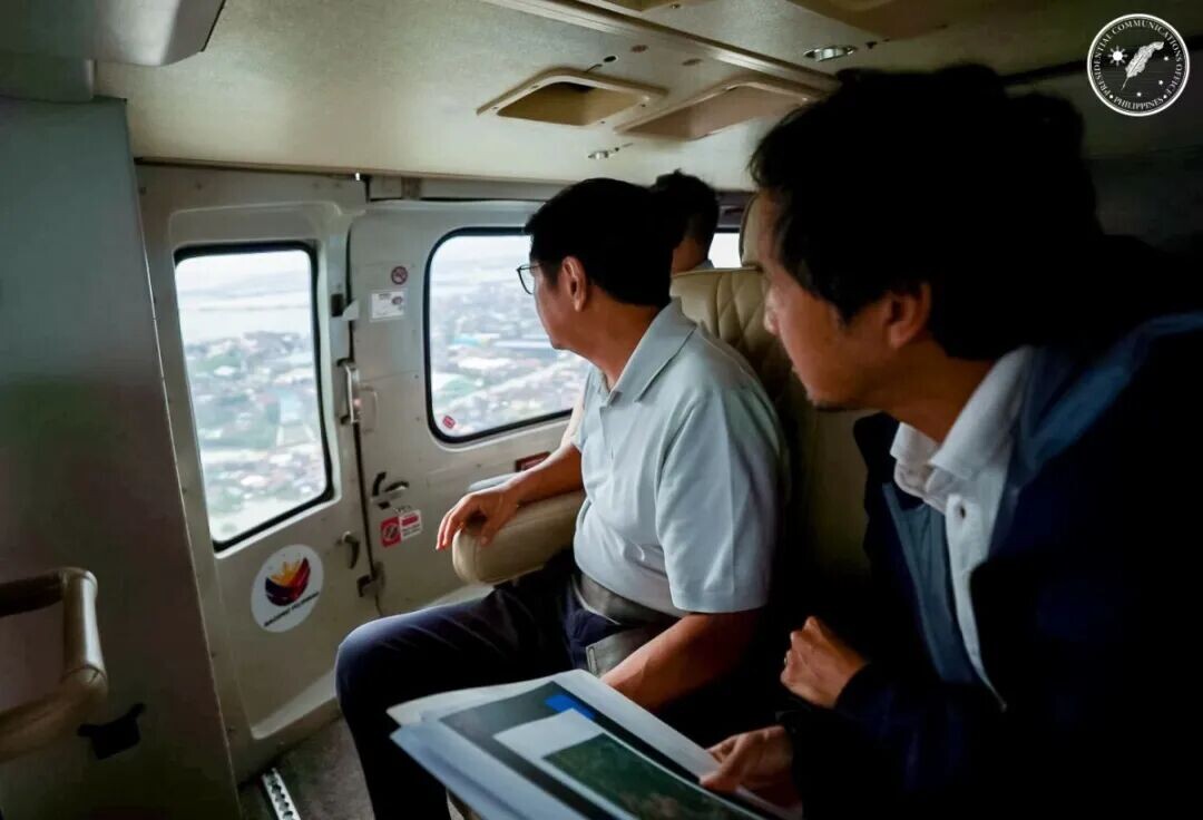 President Ferdinand R. Marcos Jr. conducts an aerial inspection over flooded areas in Bulacan and Pampanga on Aug. 24, 2026. (PCO)